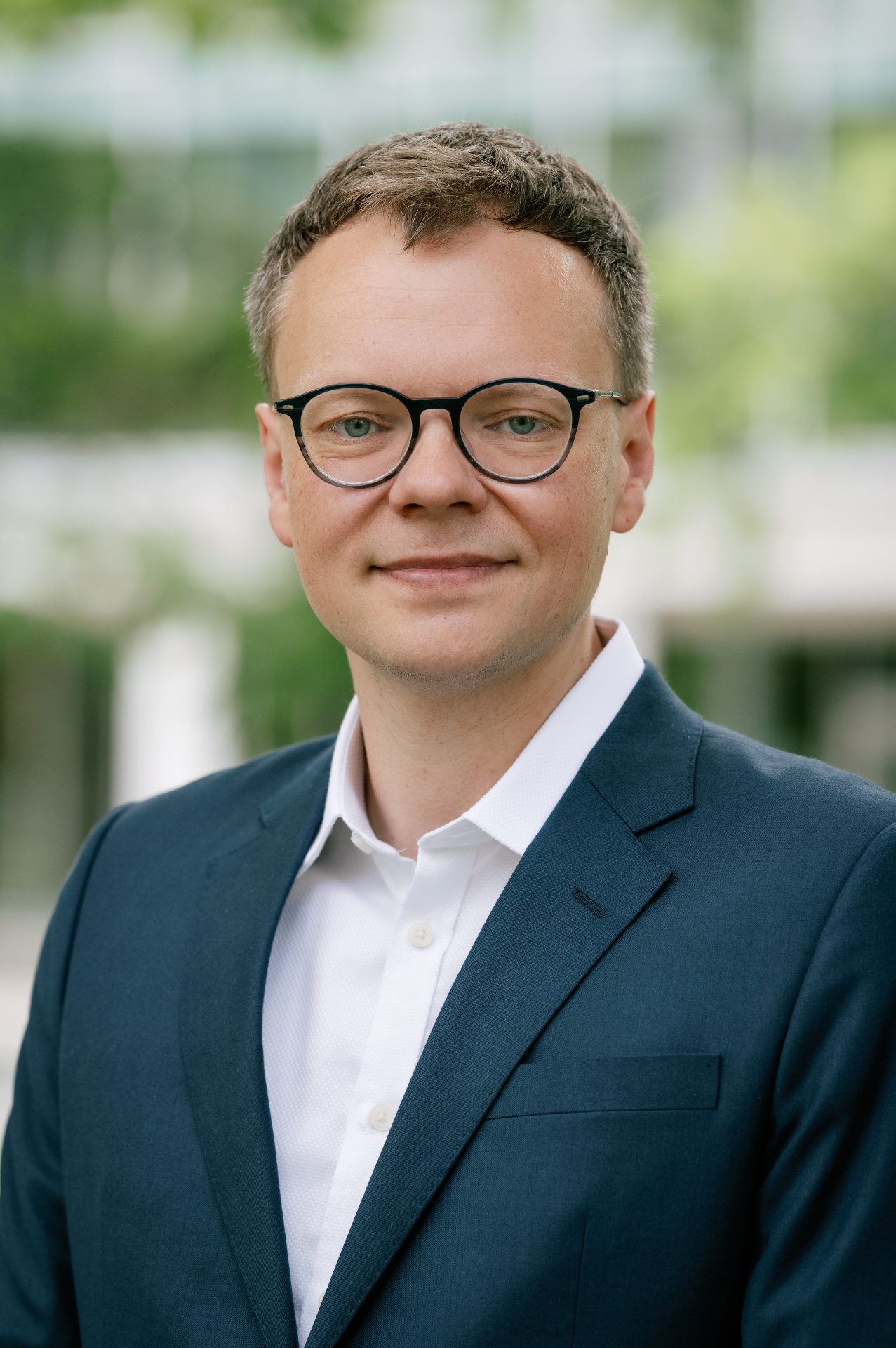 Dr. Yann Cornil headshot